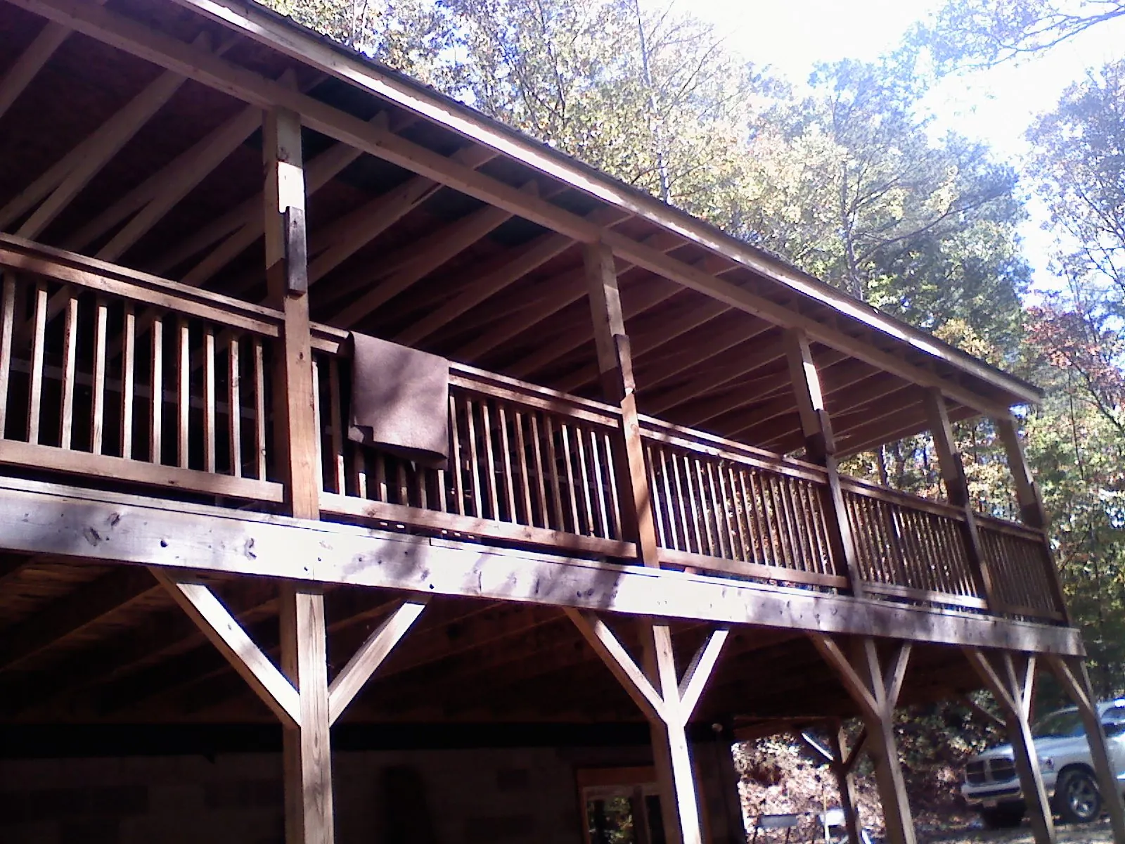 Timber framing under a new elevated porch and deck — Roof Leak Repair in Ward by Roofing Brothers